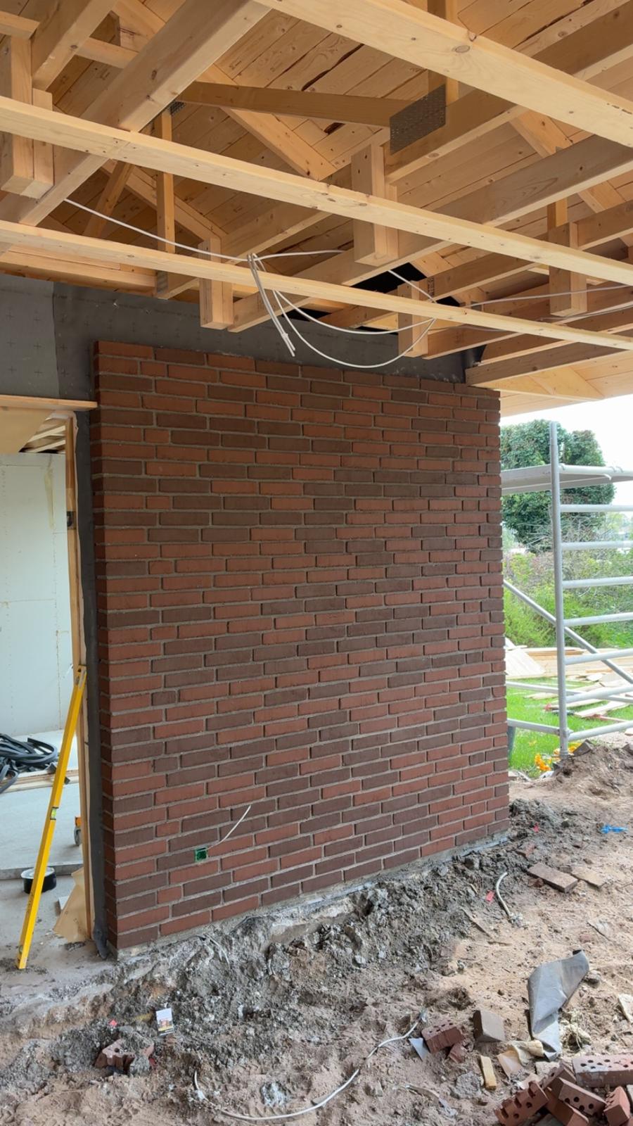 Skalmuring på trækonstruktion